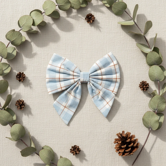 Plaid bow tie with blue and orange pattern on a white background
