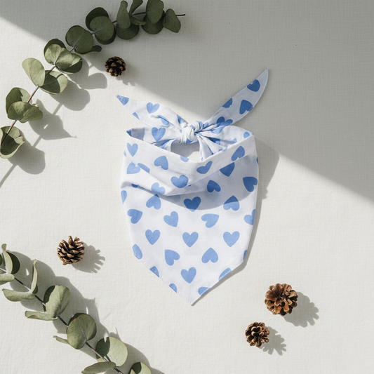 White bandana with blue heart patterns on a white background